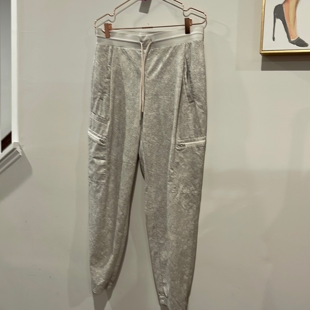 ATHLETA Venture Tan animal printed pant. Size 10
